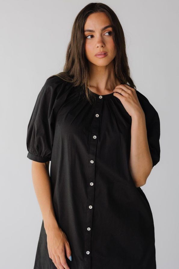 Close_view_of_black_button_down_dress