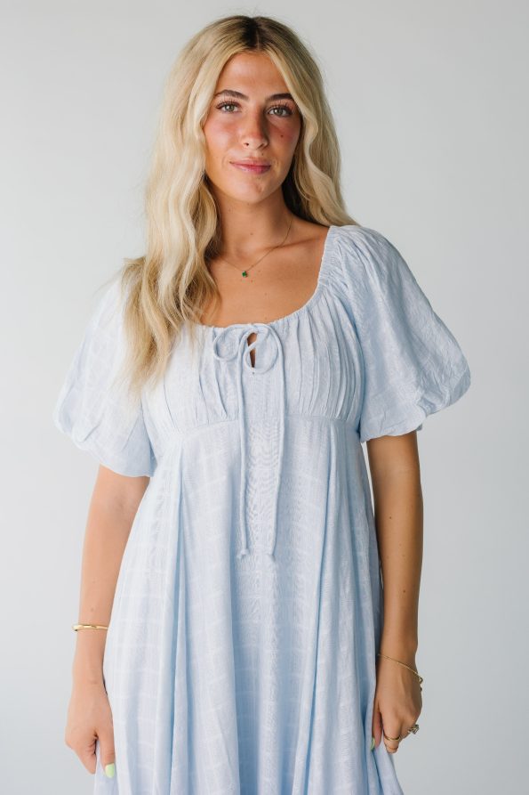 Close_view_of_light_blue_scoop_neck_dress_with_short_sleeves_for_women
